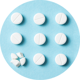 9 white pills - one broken into pieces